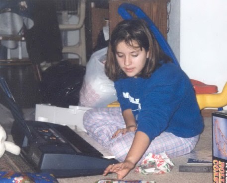 Sally on Christmas day.  Check out the new keyboard.  Yeah!!!